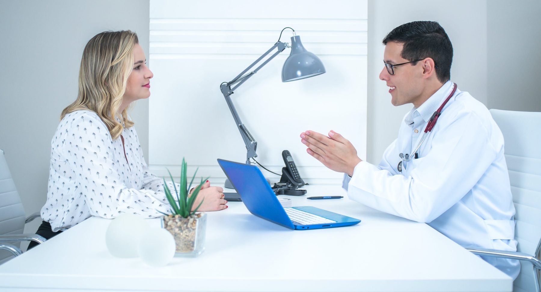 A pregnant woman consulting a doctor about the signs of an incomplete abortion